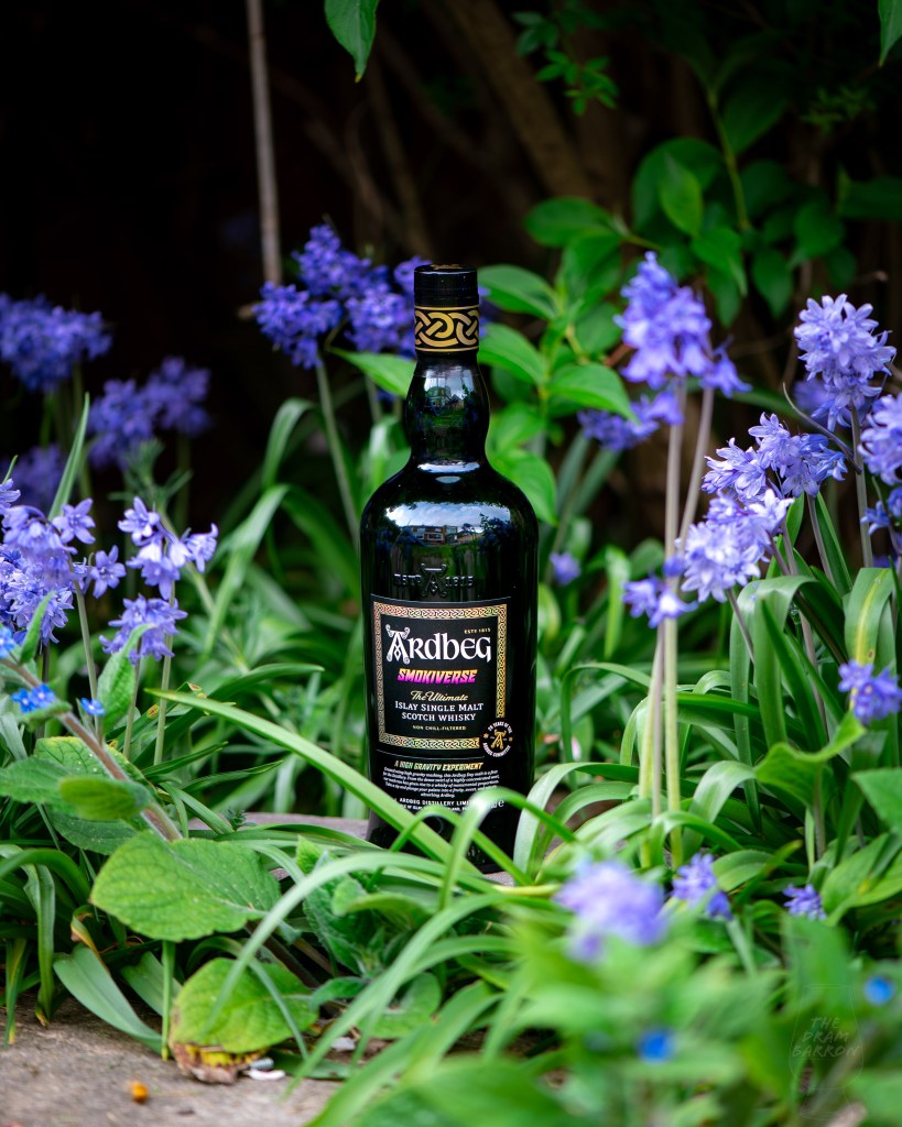 Ardbeg Smokiverse Whisky in wild flowers